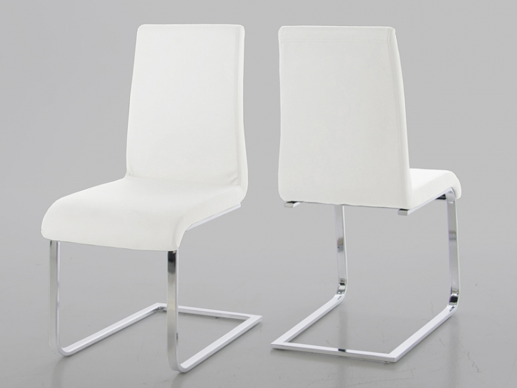 Bílé jídelní židle na pérové ​​konstrukci s chromovou podnoží